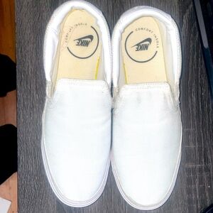 White Nike canvas slip ons